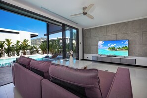 Design Villa, 4 Bedrooms, Pool View | Living area | 65-inch flat-screen TV with cable channels - Loft-Style 4BR Salt Pool Villa Sunset 6 (Rawai)