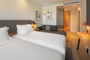 Premium Room, Multiple Beds | Minibar, in-room safe, desk, soundproofing - Holiday Inn Braga by IHG (Braga)