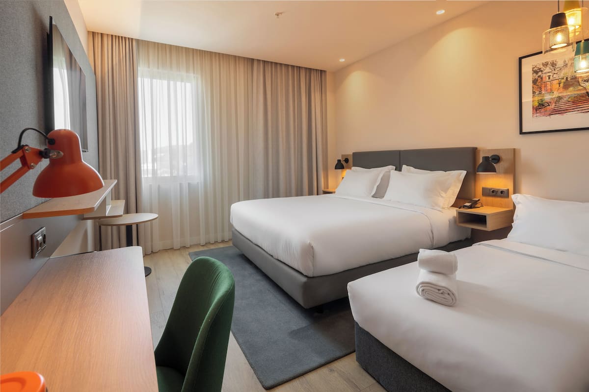 Premium Room, 1 King Bed with Sofa bed, Pool View | Minibar, in-room safe, desk, soundproofing