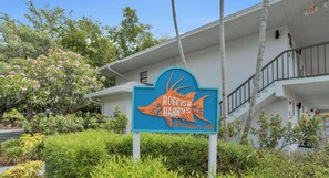 A sign for Hogshead's Restaurant-Bar with a fish graphic. - B-110 - Completely renovated first floor condo (Naples)