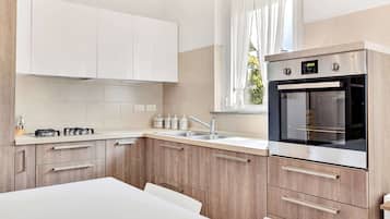 Appartamento Comfort, vista giardino | Cucina privata