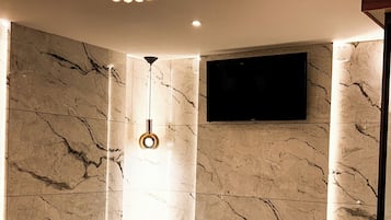 Premium Suite, Balcony, City View | Bathroom | Shower, rainfall showerhead, towels, soap