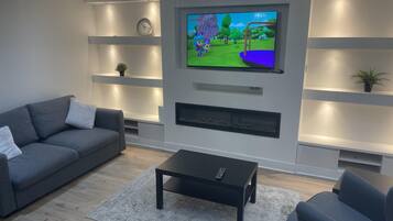 House | Living area | TV, fireplace