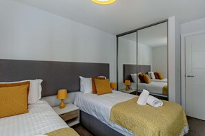2 dormitorios, tabla de planchar con plancha, wifi gratis y ropa de cama