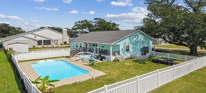 Outdoor pool, a heated pool - Oak trees, Heated Pool oasis & walk to beach! Drive to downtown 3 min! (Gulfport)