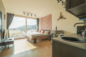 WiFi, bed sheets - Premium Smichov City Elite: Chic Industrial Suite (Prague)