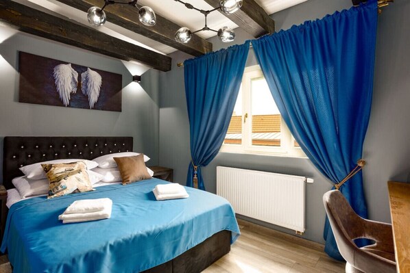 1 غرفة نوم ومكواة/لوح كي وواي فاي وملاءات أسرّة