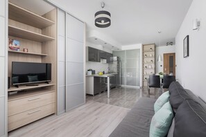Apartamento, 1 quarto, sacada | Sala de estar
