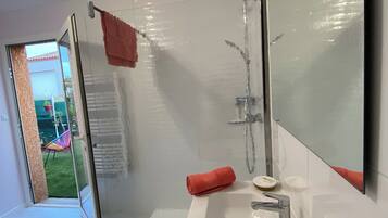 Shower, free toiletries, hair dryer, towels