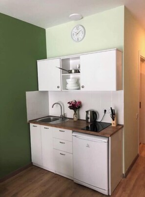 Fridge, microwave, cookware/dishes/utensils