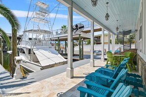 Outdoor dining - 4BR Waterfront Home with Private Pool + Lake Views | Safe Harbor (Destin)