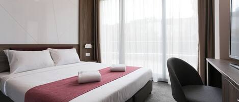 Minibar, chambres insonorisées, fer et planche à repasser, Wi-Fi gratuit