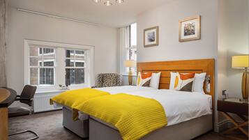 Desk, laptop workspace, blackout drapes, iron/ironing board