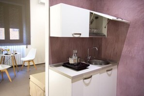 Chambre Deluxe, cuisinette | Système d’insonorisation, accès au Wi-Fi (inclus)