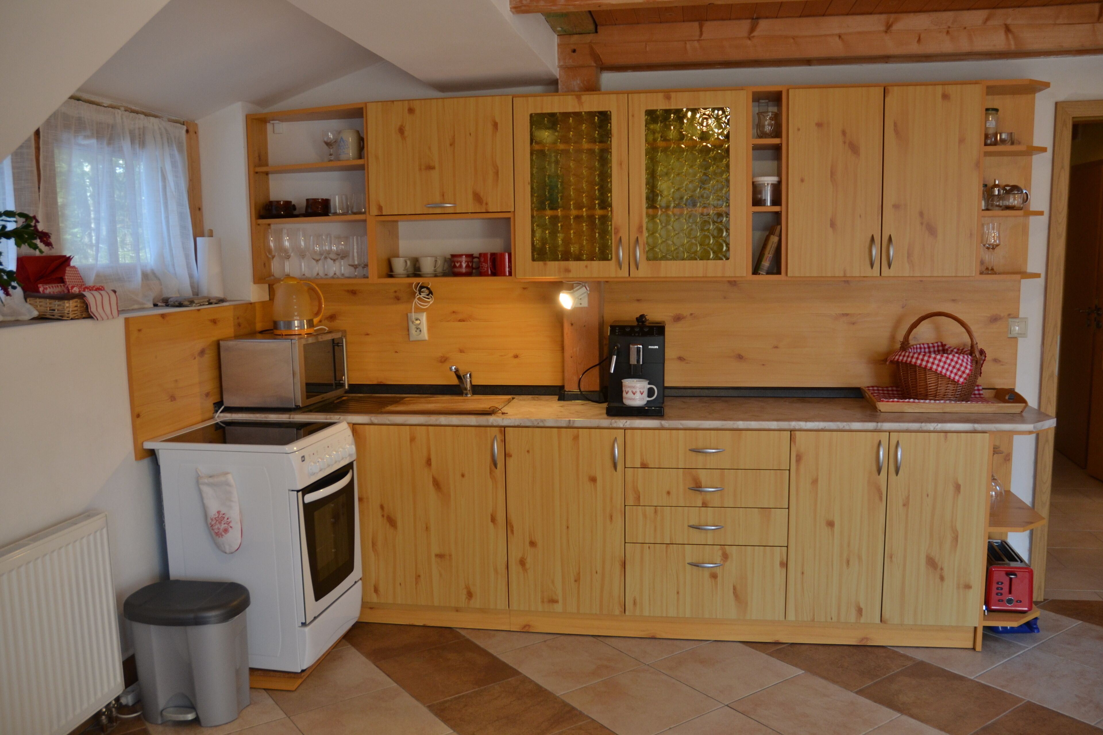 Fridge, microwave, stovetop, coffee/tea maker