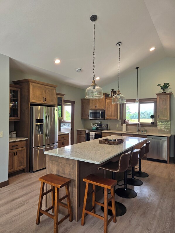 Fridge, microwave, oven, stovetop - Aurora is a 3-bedroom house in Holcombe. A year-round playground for all! (Holcombe)