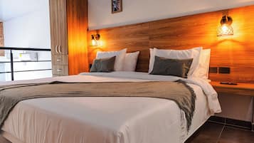 Dúplex Deluxe, balcón | 1 habitación, ropa de cama de alta calidad y camas con efecto memoria