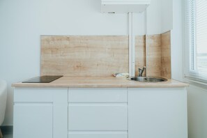 Fridge, microwave, coffee/tea maker, toaster