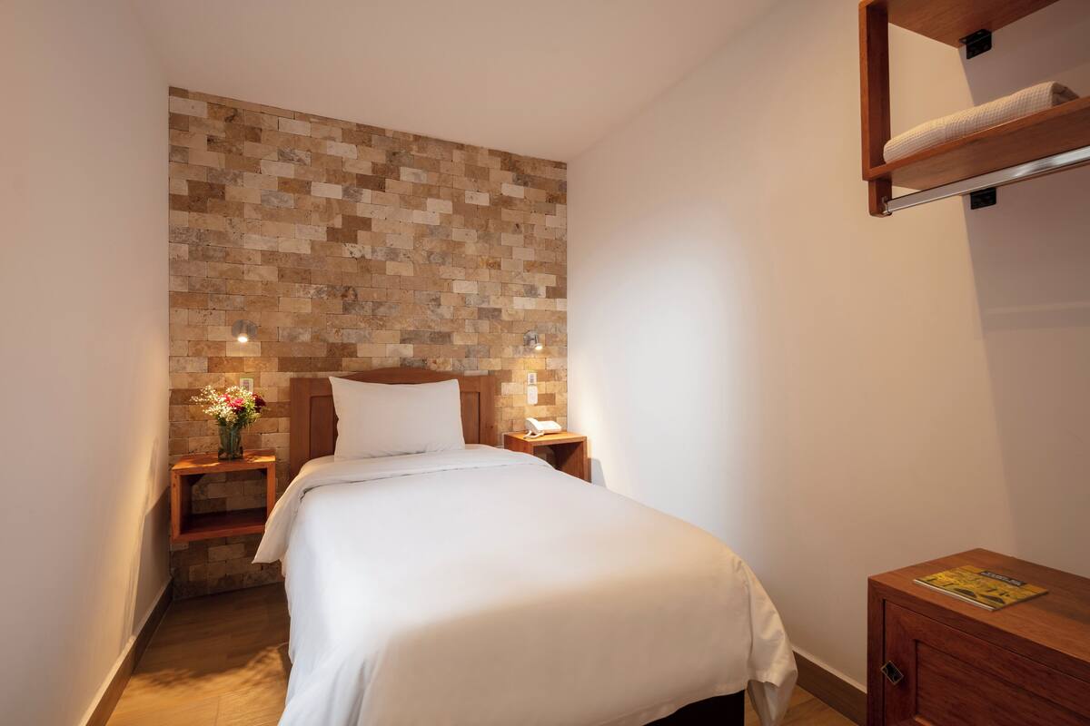Premium bedding, blackout drapes, iron/ironing board, WiFi (free)