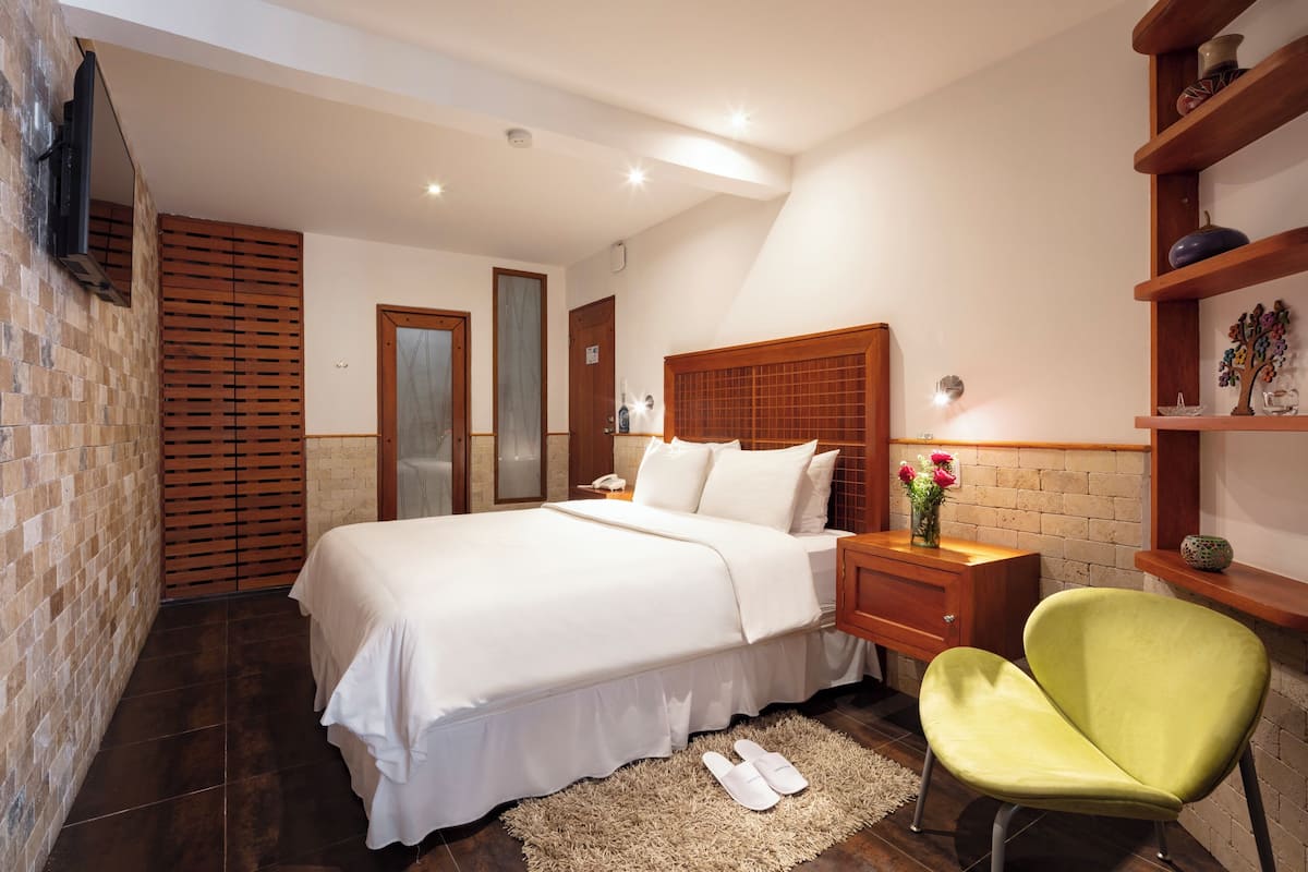 Premium bedding, blackout drapes, iron/ironing board, WiFi (free)
