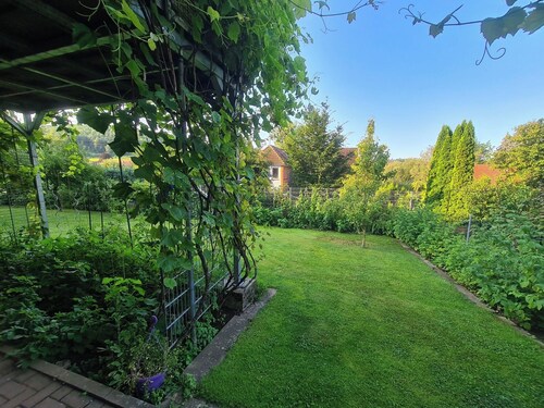 Appartment mit Garten, Saune und Terasse