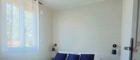 2 bedrooms, iron/ironing board, travel crib, bed sheets