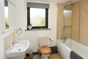 Shower, towels, soap, shampoo