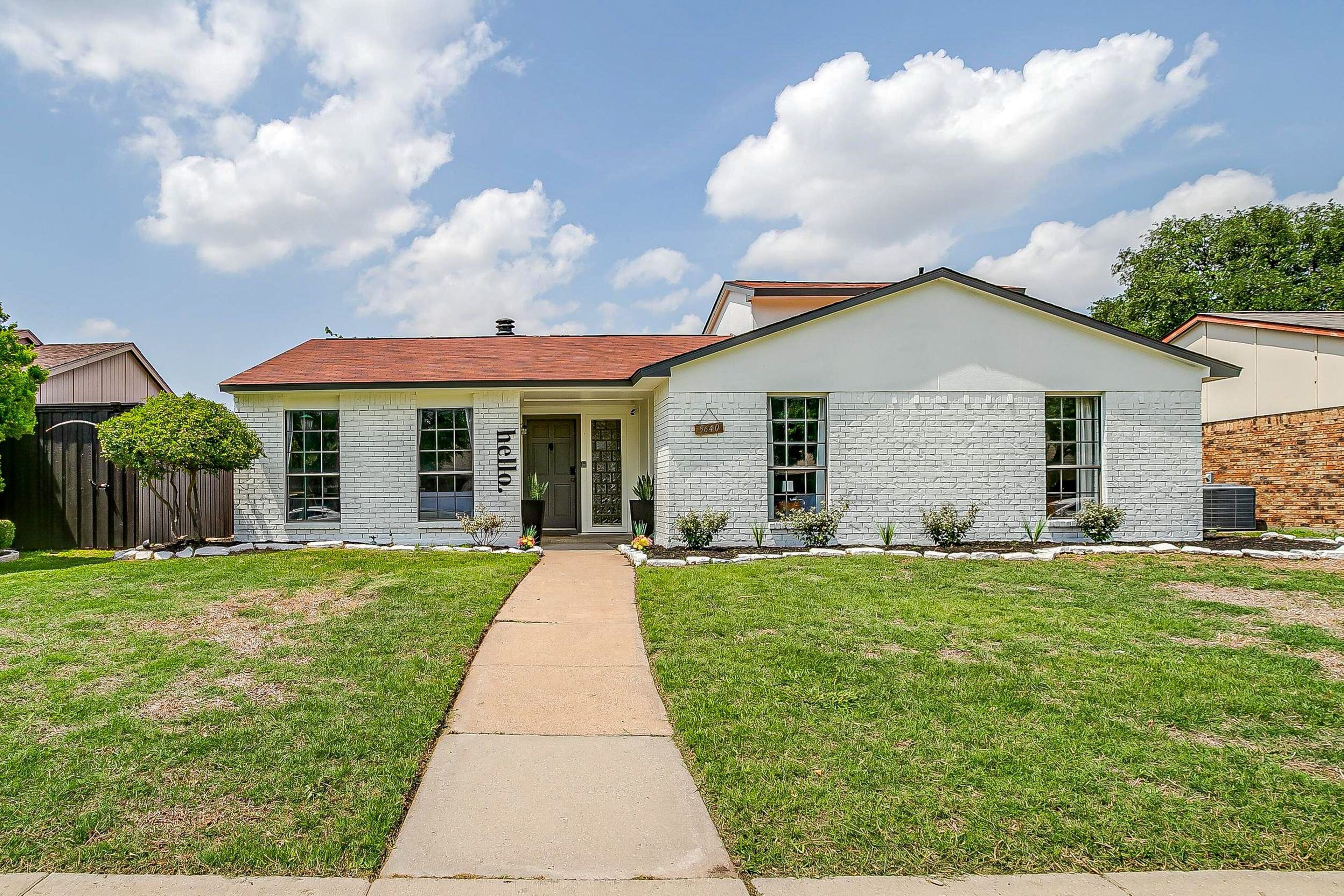 Modern 5-bedroom home with enclosed backyard