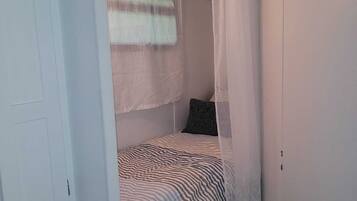 1 chambre, fer et planche à repasser, Wi-Fi, literie fournie