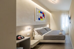 Deluxe Double or Twin Room, Private Bathroom, Partial Sea View | Premium bedding, minibar, individually decorated, individually furnished - giardini inn arte (Giardini Naxos)