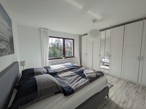 2 habitaciones, tabla de planchar con plancha, wifi y ropa de cama 