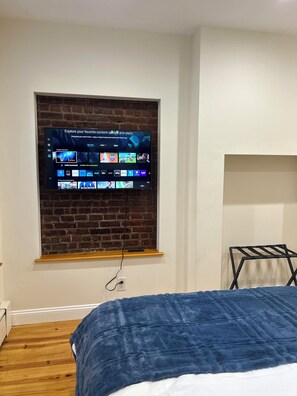 1 habitación, tabla de planchar con plancha, cuna de viaje y wifi