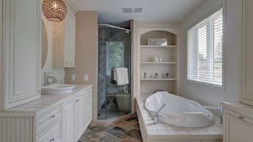 Shower, hair dryer, towels, shampoo