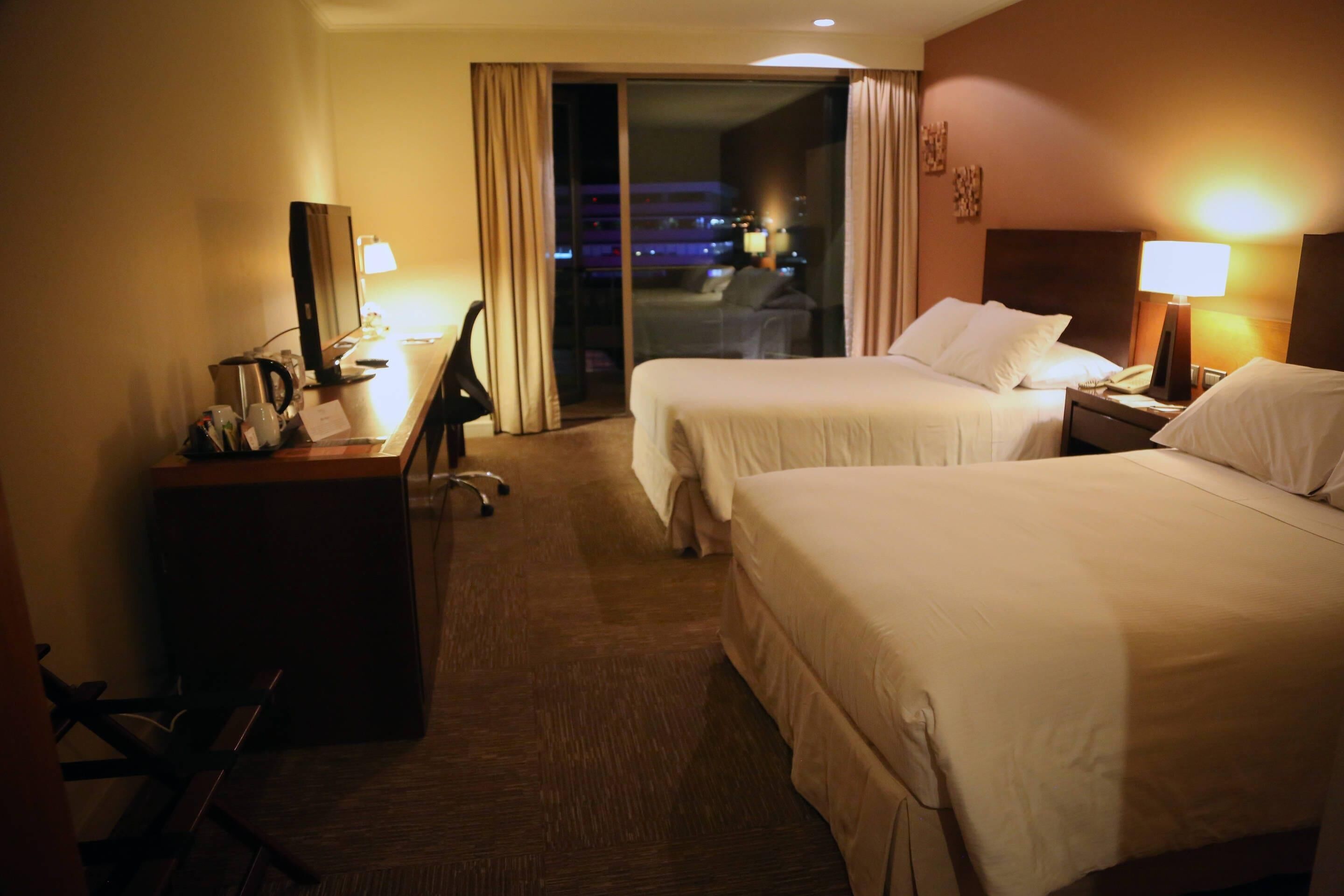 Standard Room, 2 Queen Beds, Non Smoking | In-room safe, desk, laptop workspace, blackout drapes