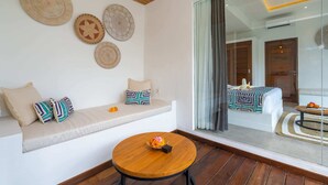 Basic Villa | Living area | 32-inch Smart TV with digital channels, streaming services - Villa Eden (Tabanan)