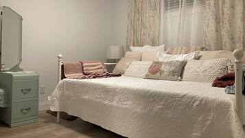 2 bedrooms, desk, iron/ironing board, travel crib
