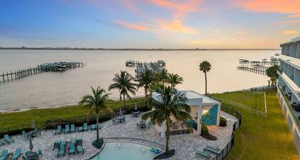 Sleek Coastal Condo with Stunning Riverfront Views and Luxury Amenities