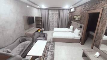 Desk, laptop workspace, blackout curtains, free WiFi