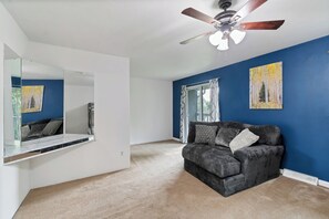 Smart TV, fireplace, table football, books