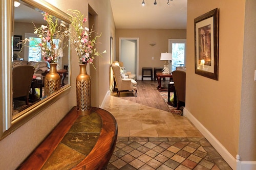 5 bedroom 3 bath hot tub. 7 beds 6 cars parking and fenced yard .