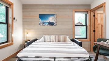 1 habitación, tabla de planchar con plancha, cuna de viaje y wifi