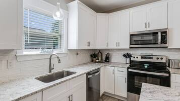 Fridge, microwave, dishwasher, coffee/tea maker