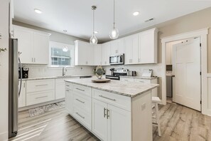 Fridge, microwave, dishwasher, coffee/tea maker