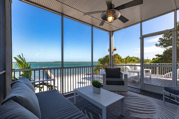 Terrace/patio - Frank & Norma's Oasis: Stunning 3BR Open Water Home on Sugarloaf, Pool, Beach, Dock & Dog Friendly (Sugarloaf Key)