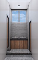 Un baño con dos lavamanos, una ventana y un armario de madera.