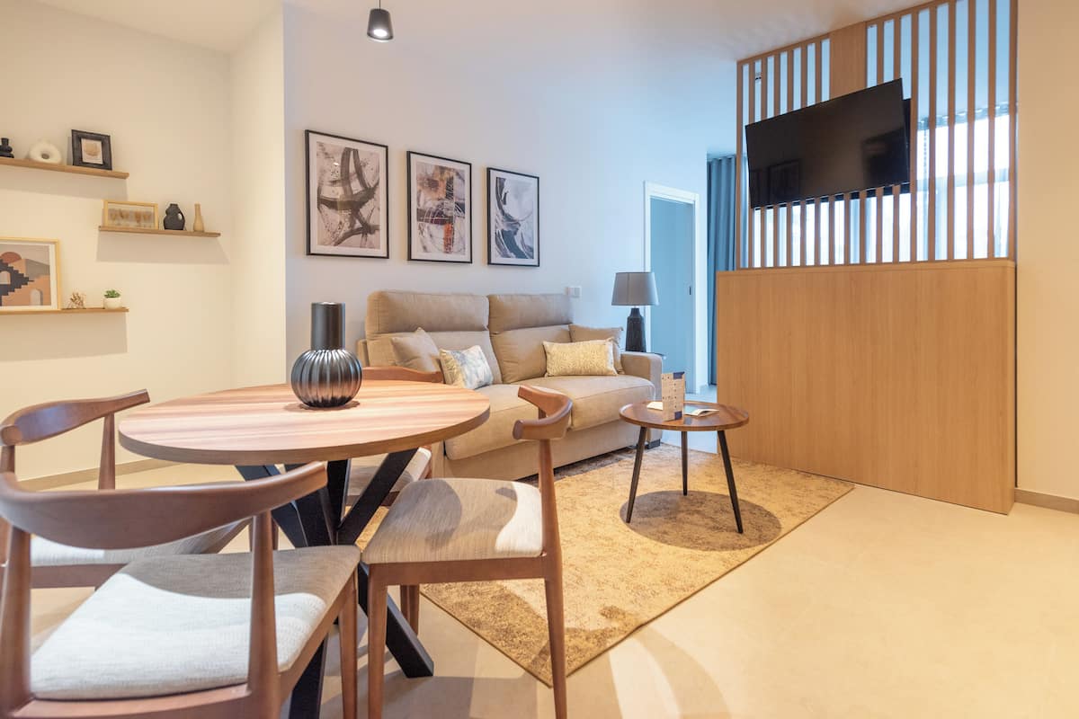 Family Apartment | Living area | 15-inch flat-screen TV with digital channels