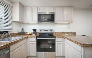 Fridge, oven, stovetop, dishwasher - Royal Sea Cliff Kona 202 Ocean View 1 Bedroom (Kailua Kona)