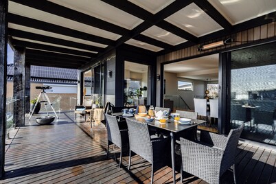 4BR Coastal Retreat w/ Pool, Bay Views, Games Room & EV – Sleeps 10