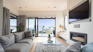 Smart TV, fireplace, table football, books