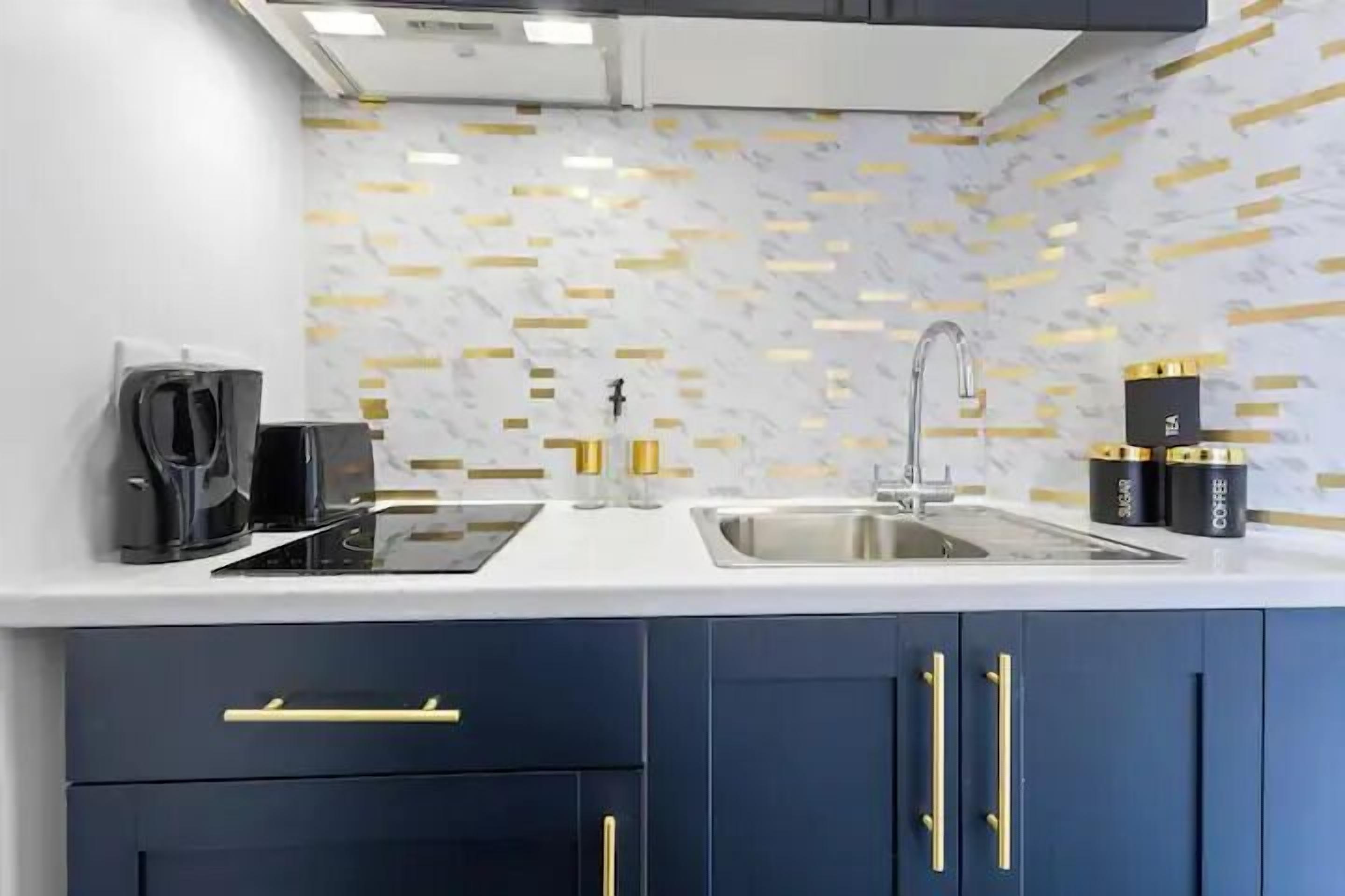 Fridge, microwave, stovetop, cookware/dishes/utensils